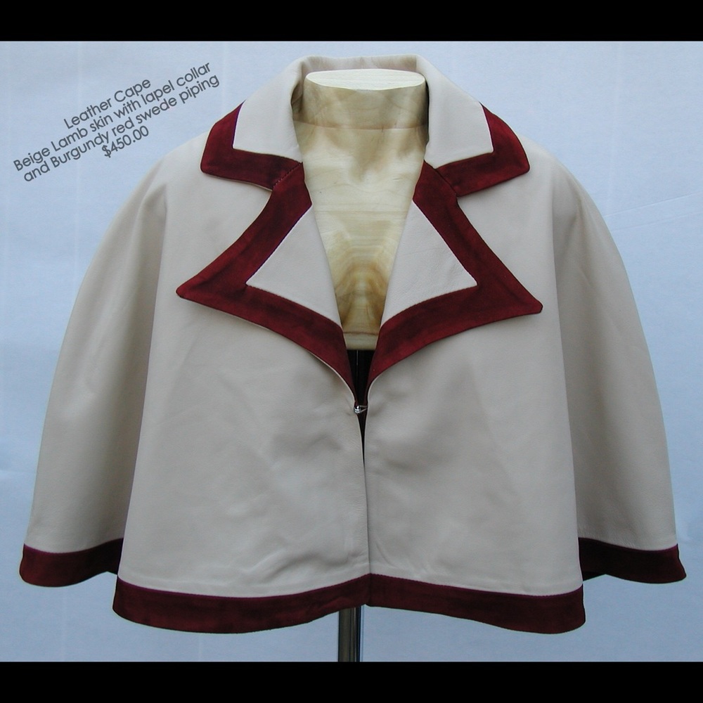 Beige lamb skin cape with burgundy Swede trim